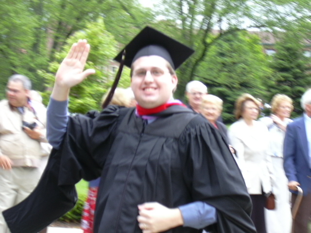 Some strange person is waving to the camera