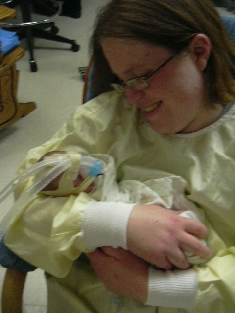 Me holding Daniel for the first time on April 25. 2009.  He was almost 3 weeks old and just off the ventilator.